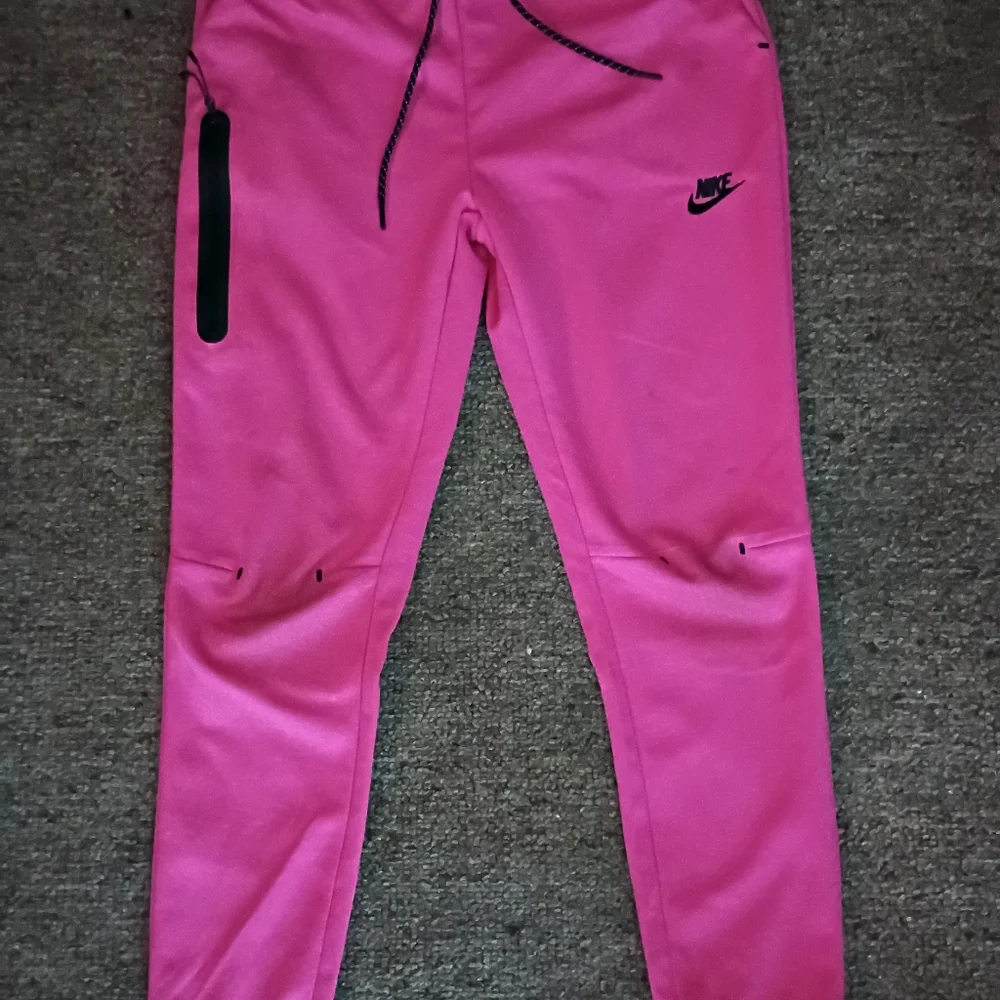 Nike Women's Vibrant Pink Joggers with Black Accents - Picture 1 of 1